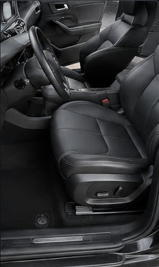 Same interior after detailing, clean seats and floor